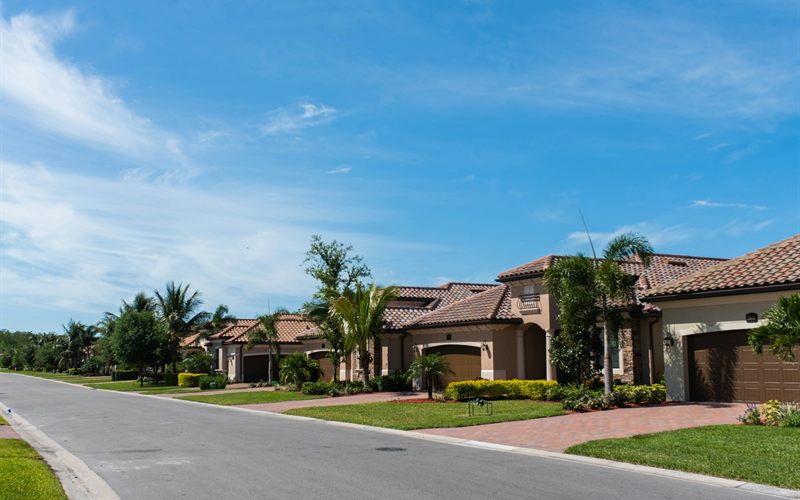 Suburban Florida street lined with tile-roof homes